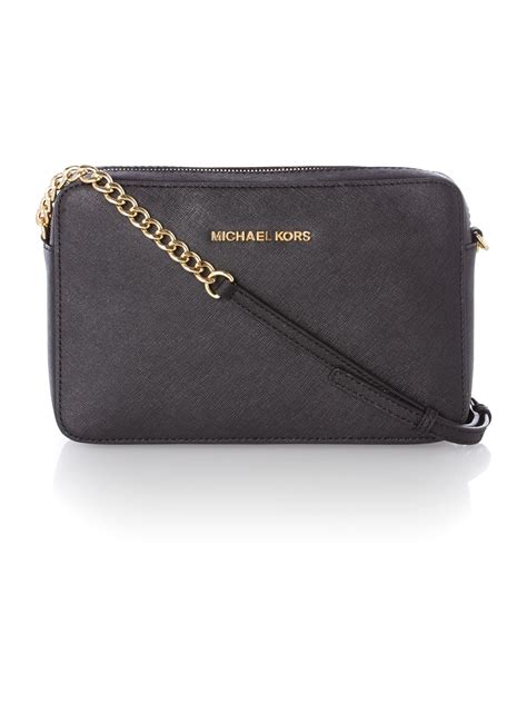 michael kors jet set travel small black crossbody bag|Michael Kors jet set vanilla.